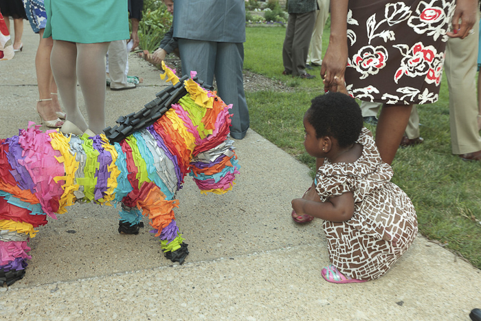BellaFigura-Realwedding-Candice&Sean The wedding pinata from Candice & Sean's colorful, backyard wedding was a huge hit!