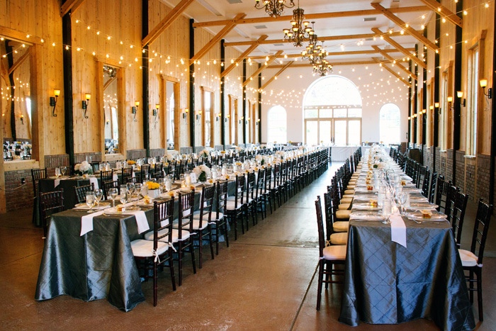 Dramatic tables at Jennifer & John's wedding -- a Bella Figura real wedding Instead of a lot of round tables, Jennifer and John opted for 3 dramatically long tables to create a sense of community and warmth