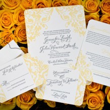 Elegant swirly wedding invitations from Bella Figura, letterpress printed in yellow & gray inks